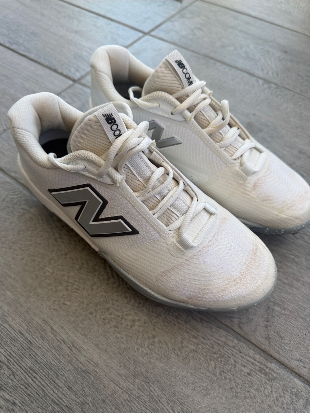 New Balance FuelCell COMPv4
molded baseball
cleats. CCOMPTW4 White.